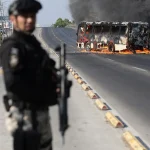 Mexico violence after El Mencho killed: burning bus blocks highway in Jalisco