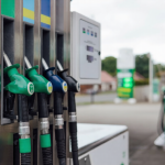 Petrol pumps at a North East England petrol station with cars refueling.