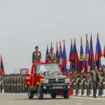 Independence Day parade at National Parade Square with military march and national flags