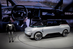 Geely robotaxi displayed with humanoid robot at Auto China 2026 in Beijing China showcasing future autonomous mobility technology