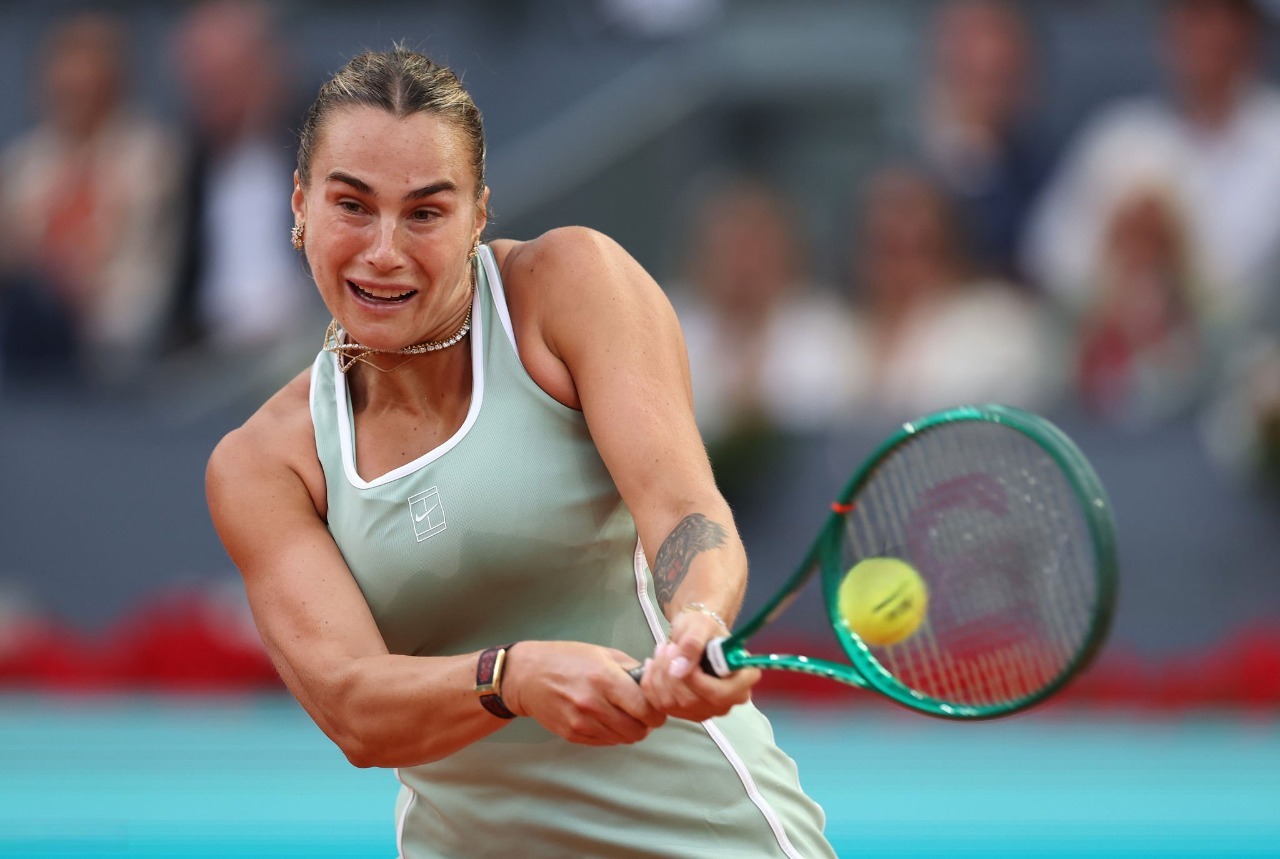 Aryna Sabalenka hitting a two-handed backhand against Jaqueline Cristian during Madrid Open 2026 Round of 32 match