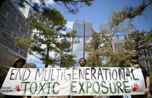Protesters at 2026 CERAWeek energy conference in Houston against climate and environmental policies