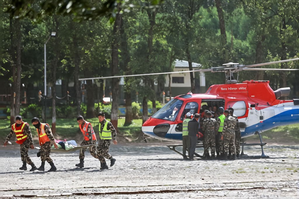 Nepal Army rescues a resident after devastating Nepal flash floods in Nuwakot